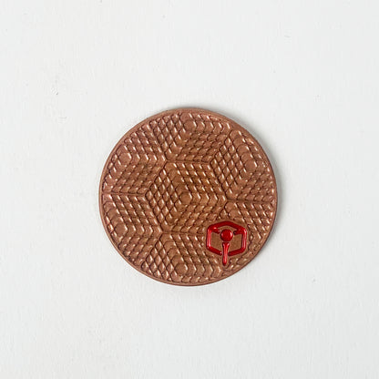 NCW 3DP copper golf ball marker with milled op-art pattern — view 2